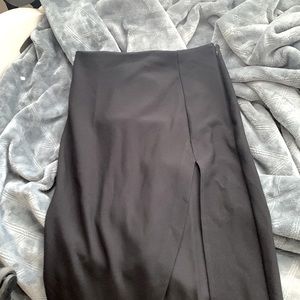Long black skirt with side slit